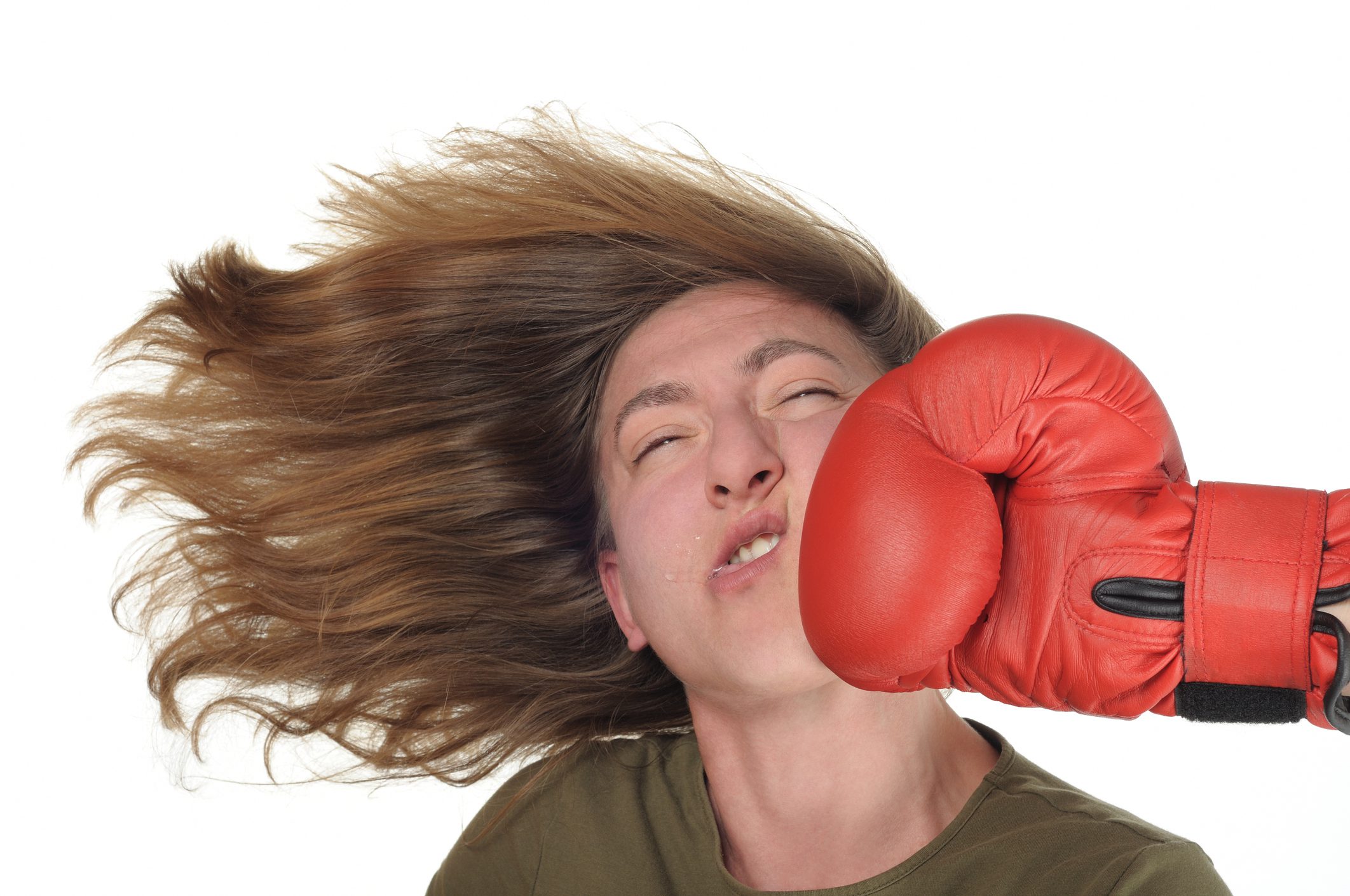 A woman is getting "punched" by the symptoms of menopause.